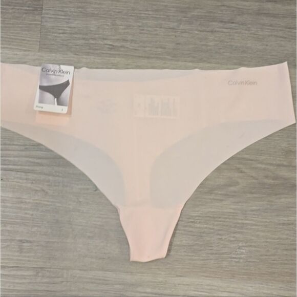 Calvin Klein Invisible Thong- Nymphs Thigh - Picture 7 of 8